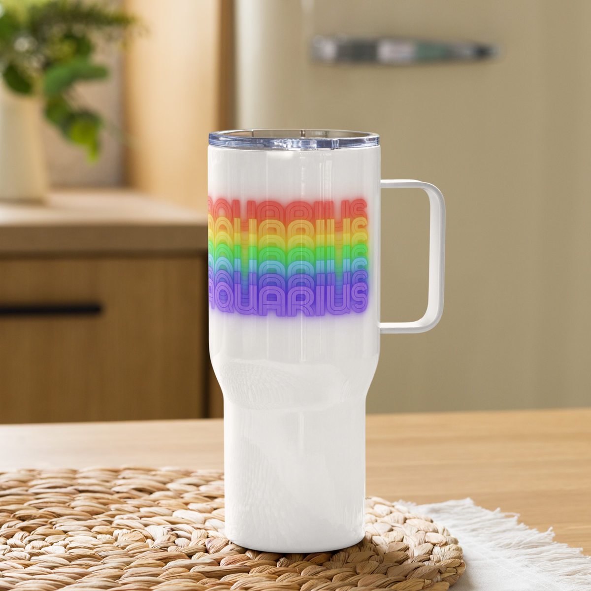 Aquarius Rainbow White Travel-Mug-with-Handle-25-oz. on a wooden surface