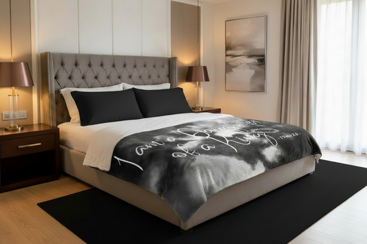 Text 'I am a Daughter of a King' with a crown of thorns on a black and white abstract background